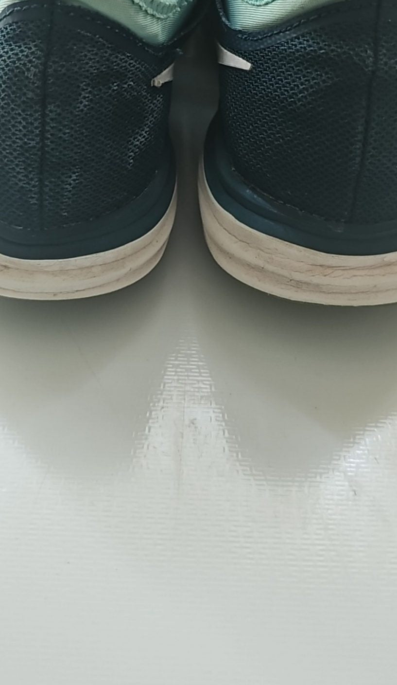 Nike black and green training shoes with mesh upper and dual fusion midsoles.