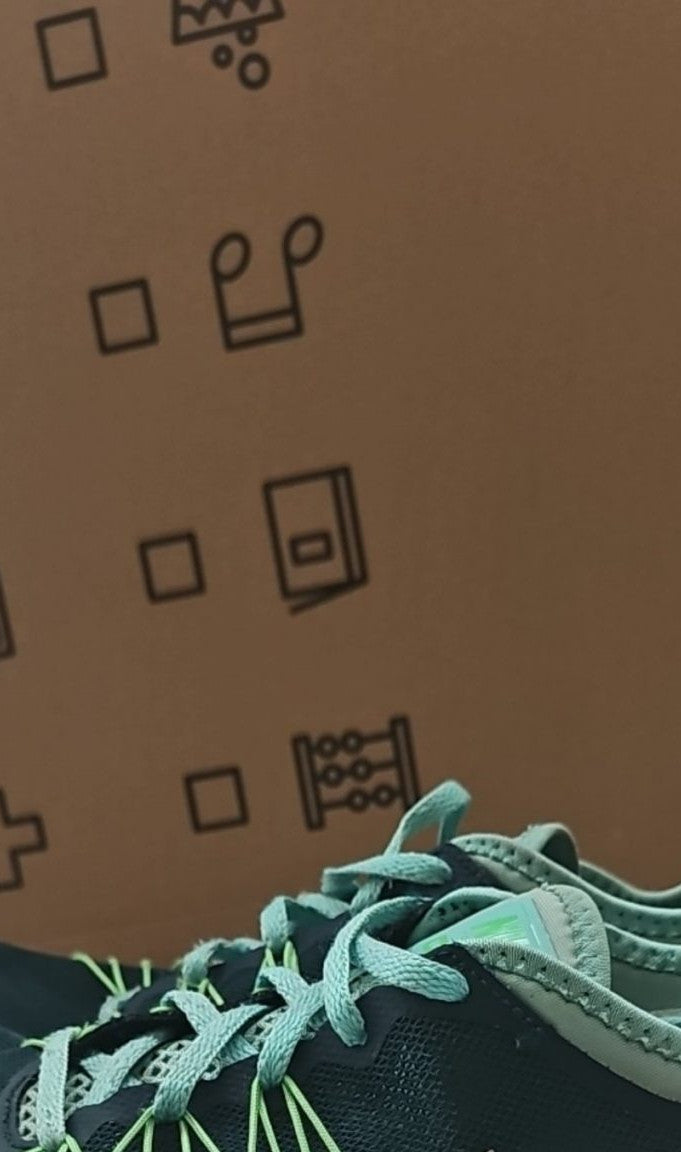 Nike black and green training shoes with mesh upper and dual fusion midsoles.