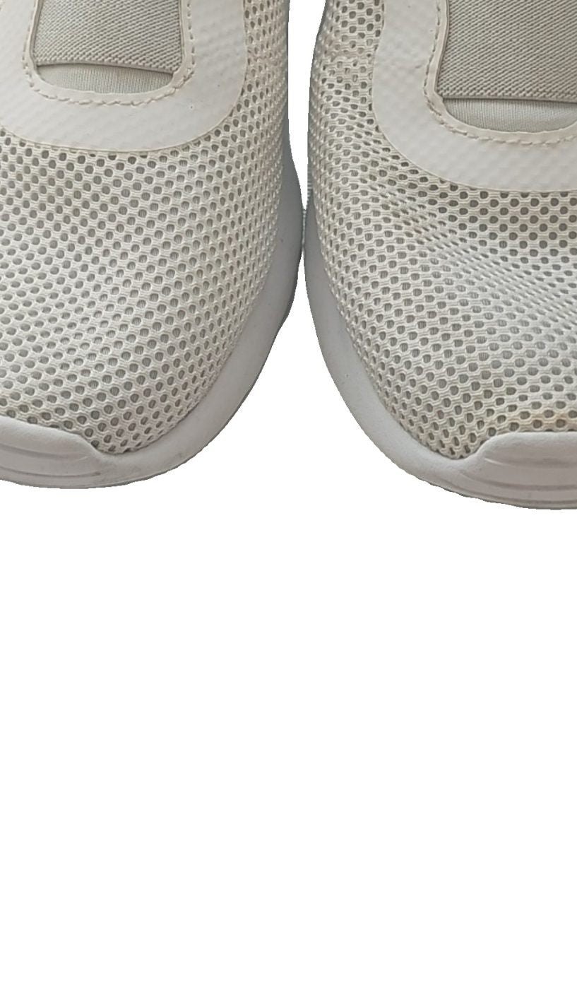 Nike slip-on trainers light grey mesh upper with branding on tongue and heel.