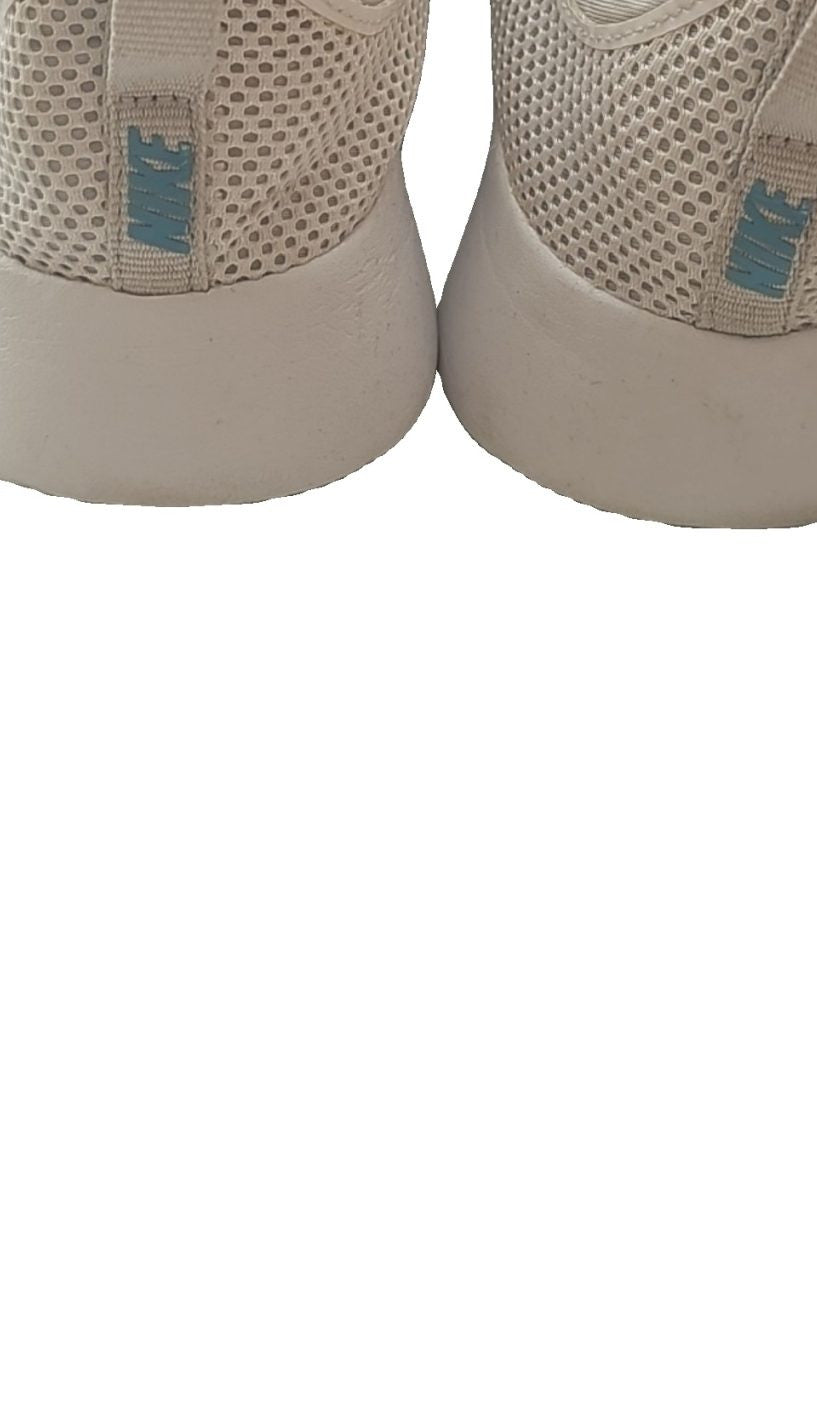 Nike slip-on trainers light grey mesh upper with branding on tongue and heel.
