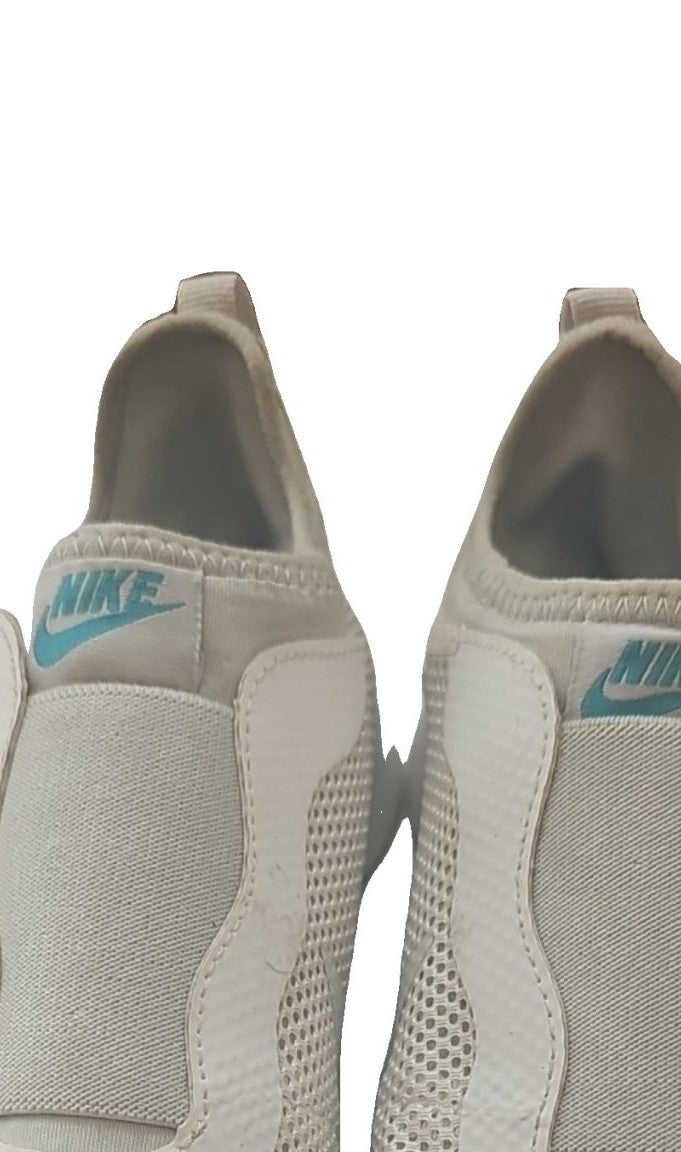 Nike slip-on trainers light grey mesh upper with branding on tongue and heel.