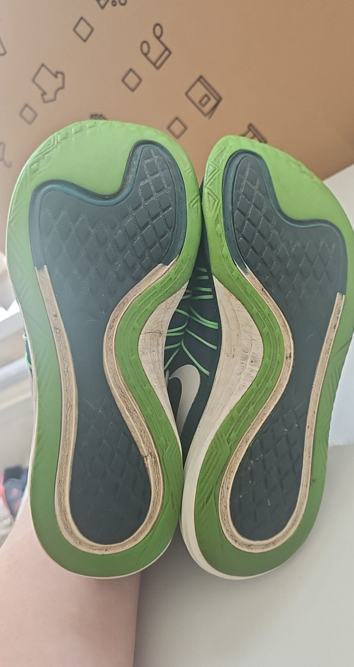 Nike black and green training shoes with mesh upper and dual fusion midsoles.