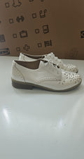 River Island beige brogues lace-up with cut-out design and metal stud detailing.